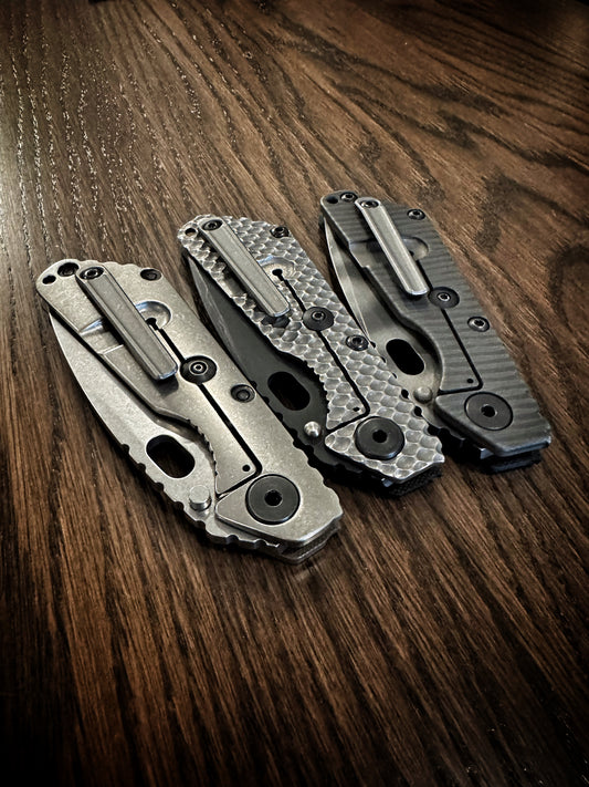 Machined pocket clip for Strider knives